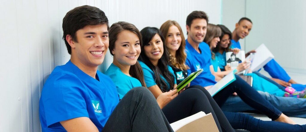 group of MaKami College students sitting and studying together