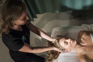 massage therapist in Canada with client