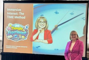Robin Landals-Hill stands beside an “Immersive Interest: The TIME Method” presentation screen at ACIFA Conference 2026.