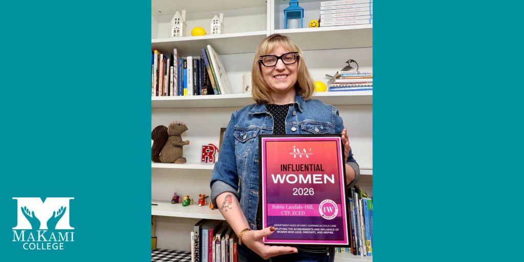 Robin Landals-Hill holds her 2026 Influential Woman recognition plaque at MaKami College.
